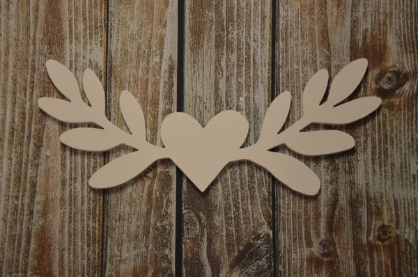 Houten decoratie hart met takjes