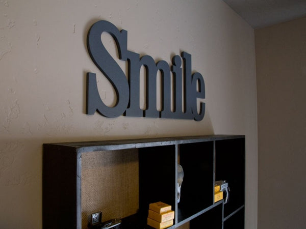 Houten letters Smile